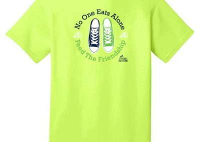 Ascent Academy No One Eats Alone campaign graphic tees silk screen printing
